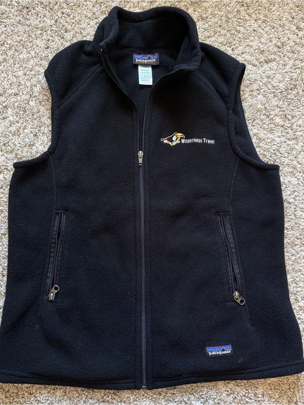 Patagonia Synchilla Wilderness Travel Toucan Black zip vest